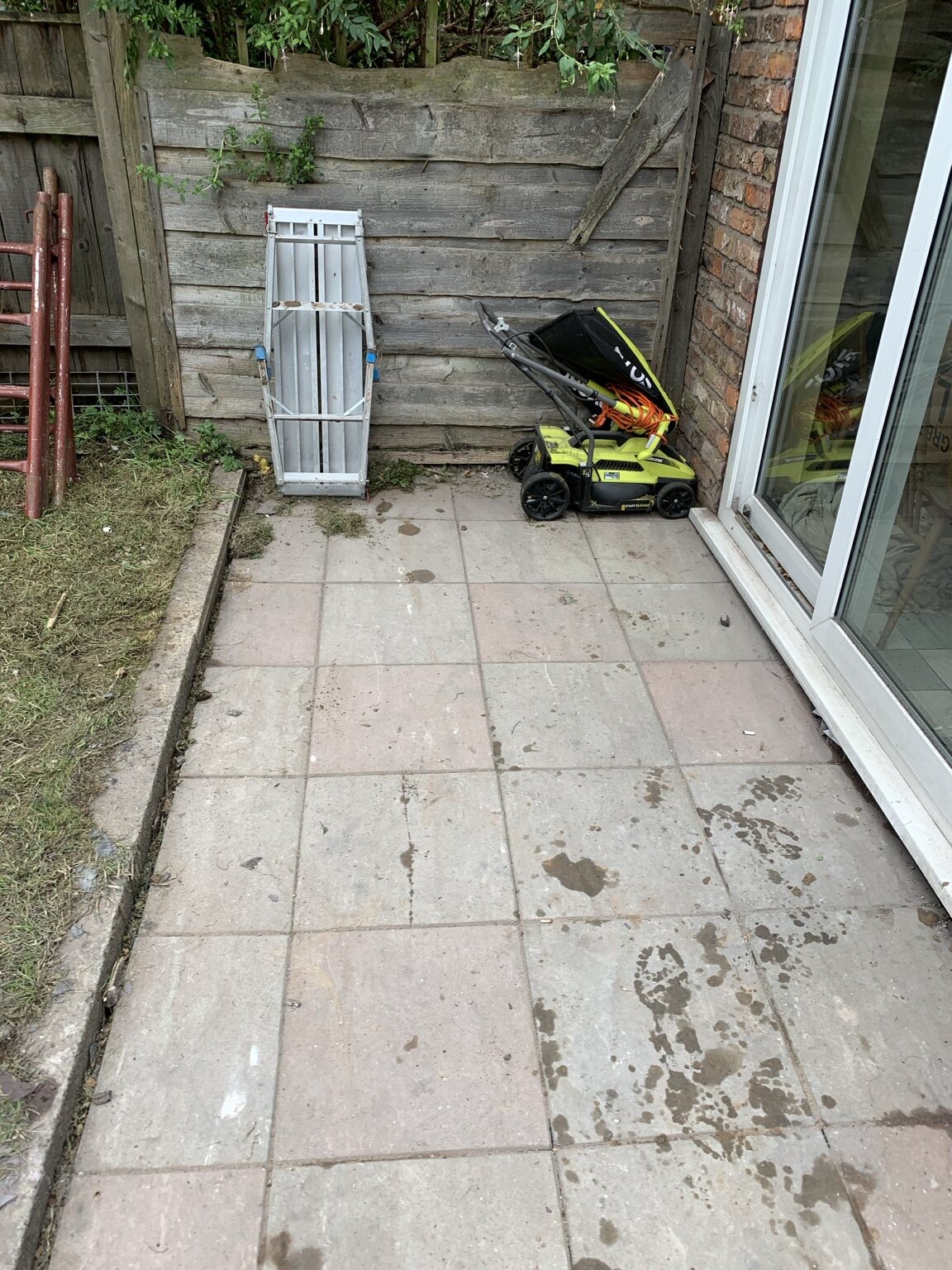 Existing paved area before removal and landscaping